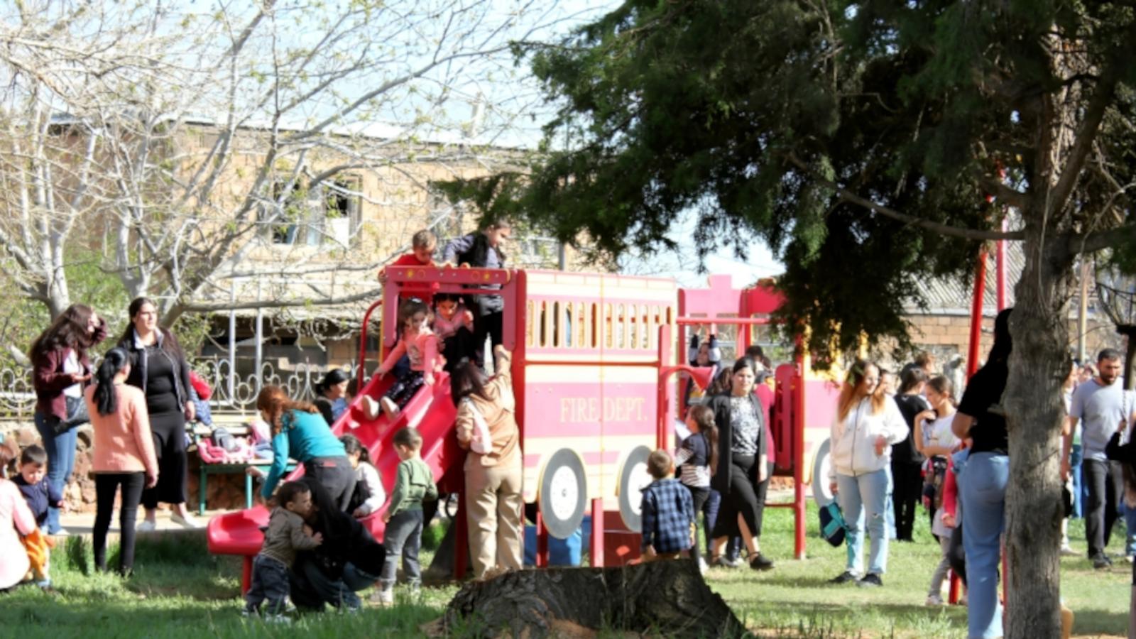 People at the revitalized playground (credit: Holly Abernathy)