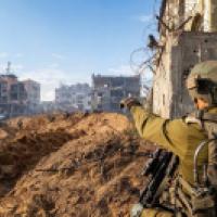 IDF soldier pointing in Gaza IDF photo